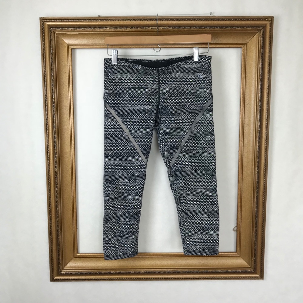 NIKE gray geometric reflective running crop pant